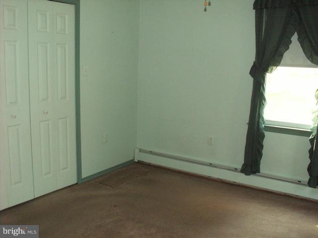 1206 Greystone Road Halethorpe, MD 21227 - Photo 7 of 10 an empty room with a window