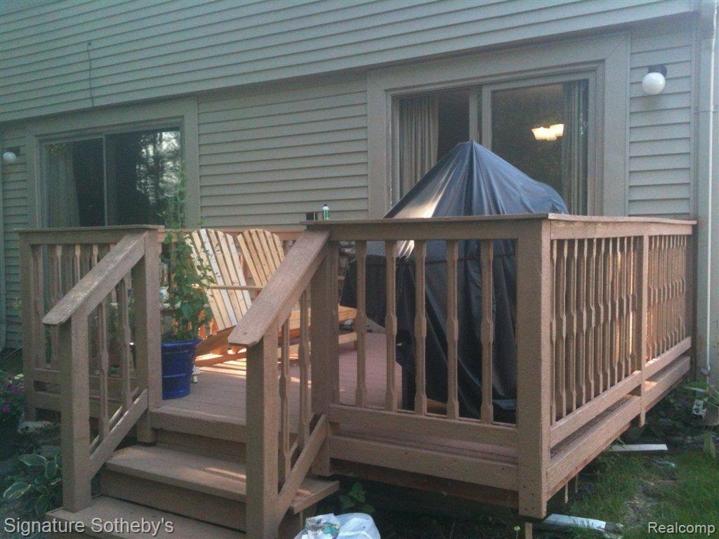 8735 22 Mile Road, Unit 13 Utica, MI 48317 - Photo 10 of 14 Deck.JPG