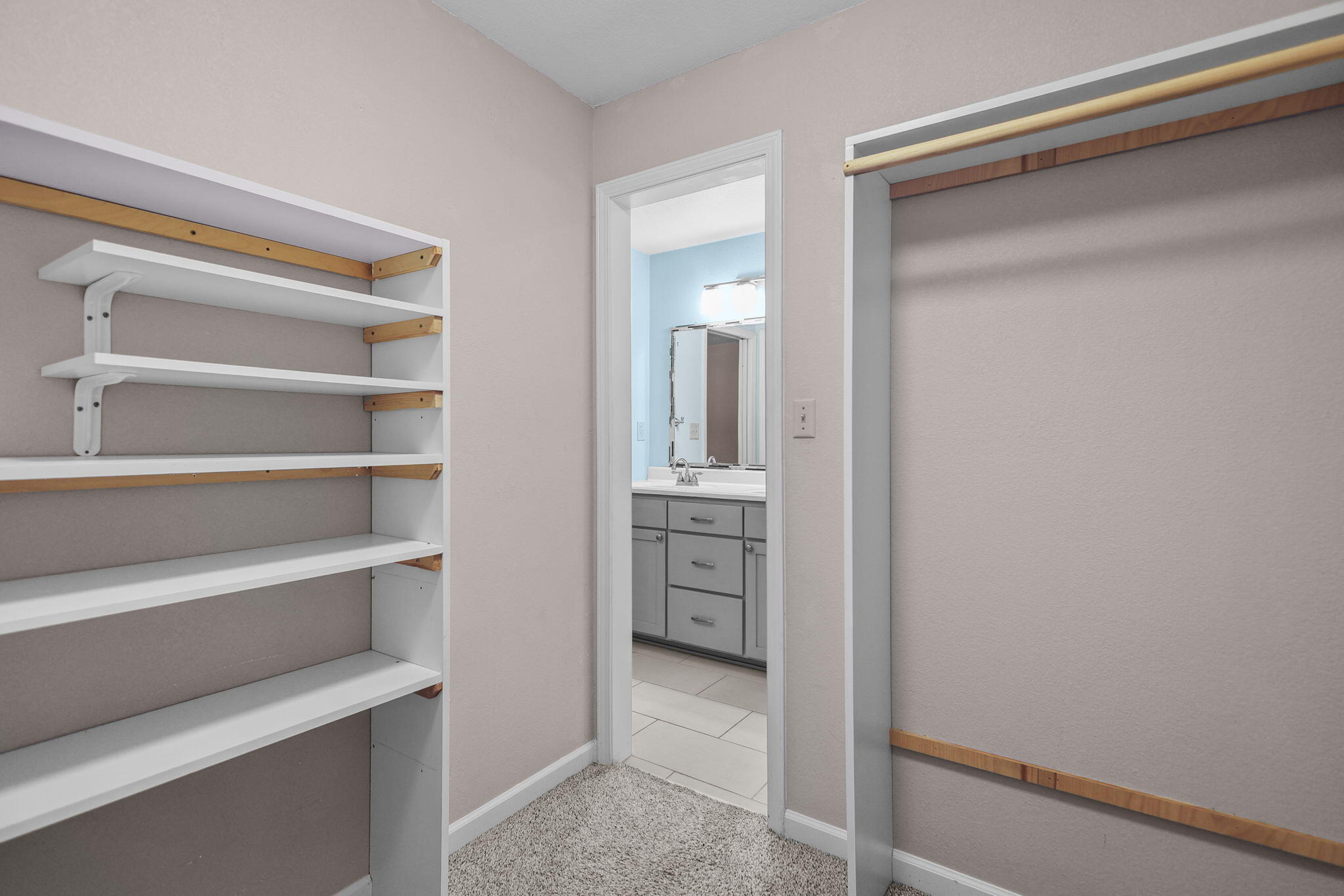 4218 Jane Street Redding, CA 96002 - Photo 17 of 50 a view of walk in closet with empty racks