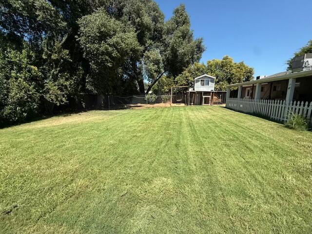 4218 Jane Street Redding, CA 96002 - Photo 39 of 50 a view of a terrace with a garden