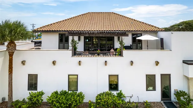 an aerial view of house with yard