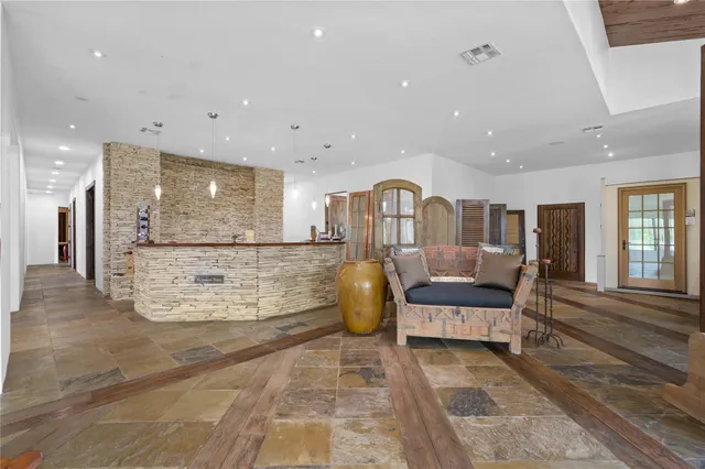 a living room with furniture and a table