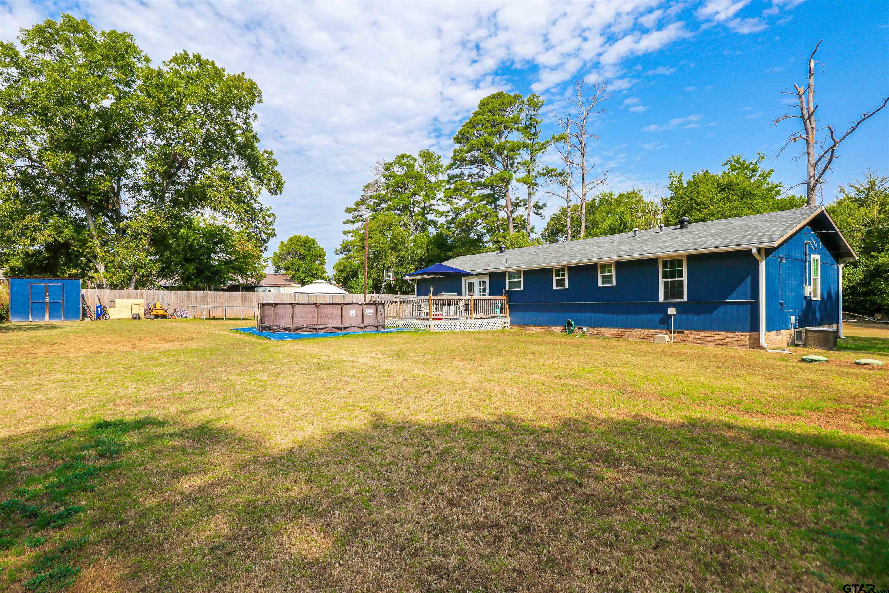 140 County Road 1541 Rusk, TX 75785 - Photo 17 of 21 a front view of house with yard and swimming pool