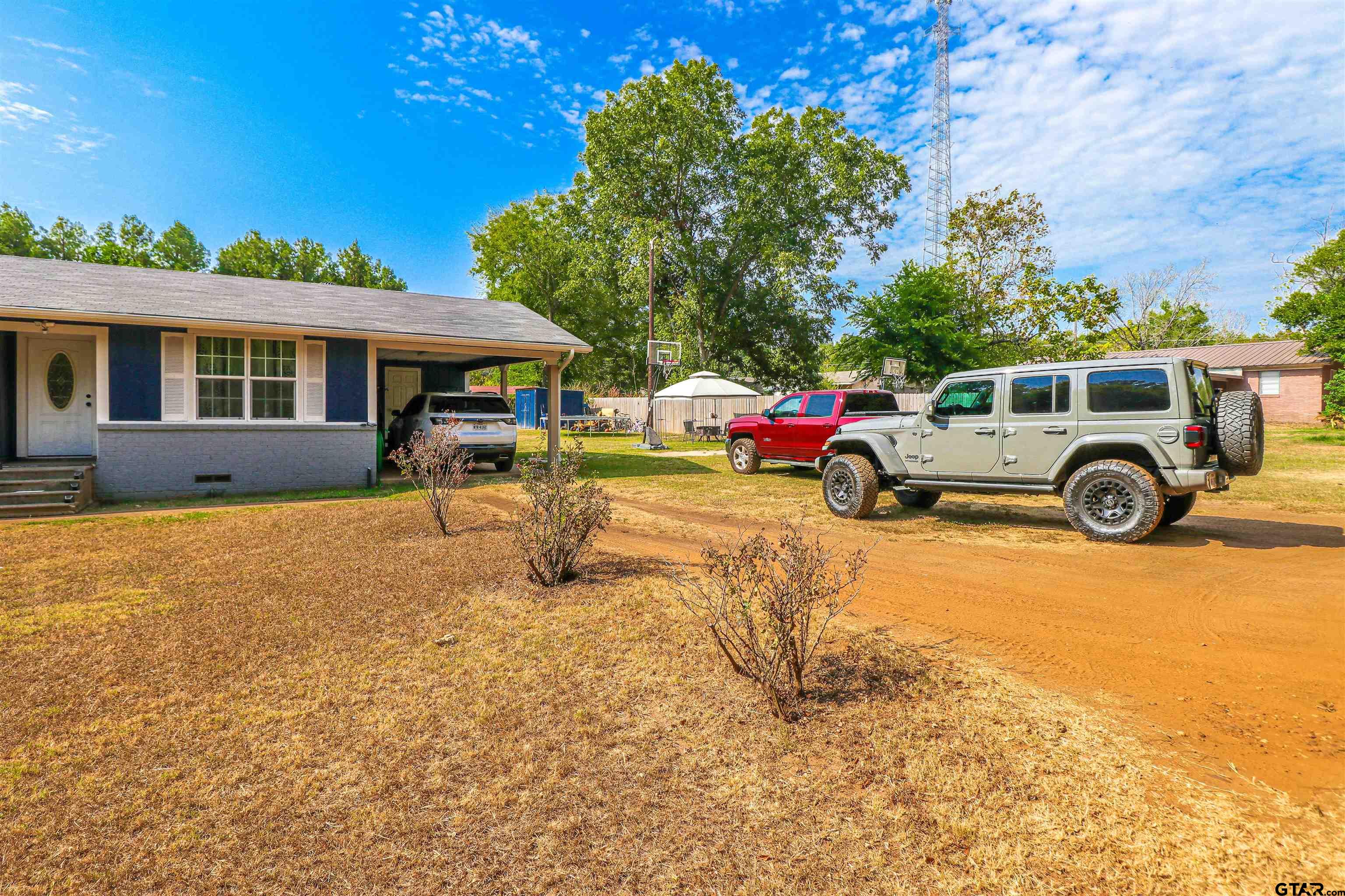 140 County Road 1541 Rusk, TX 75785 - Photo 21 of 21 a front view of a house with a yard
