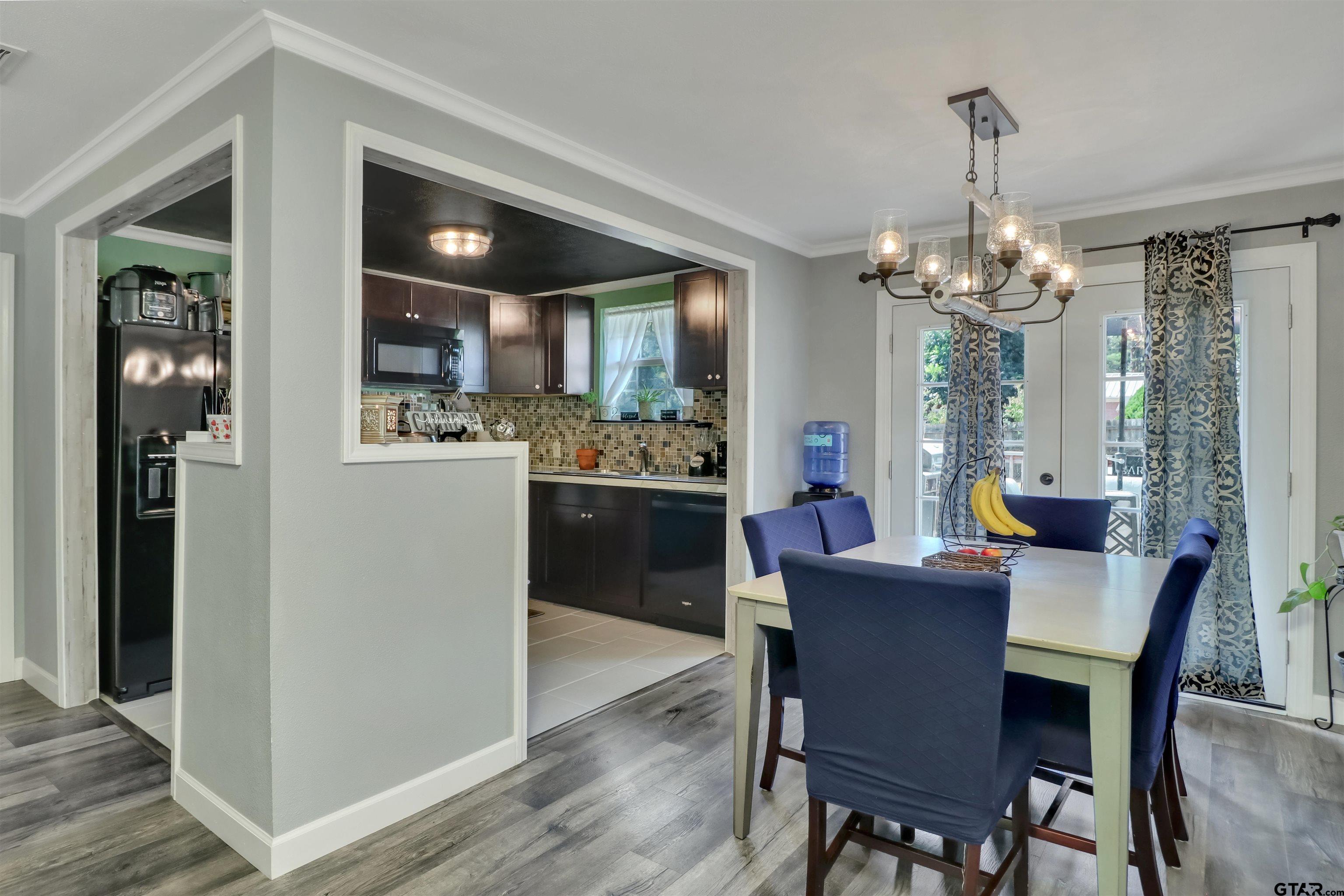 140 County Road 1541 Rusk, TX 75785 - Photo 6 of 21 a dining room with furniture and window
