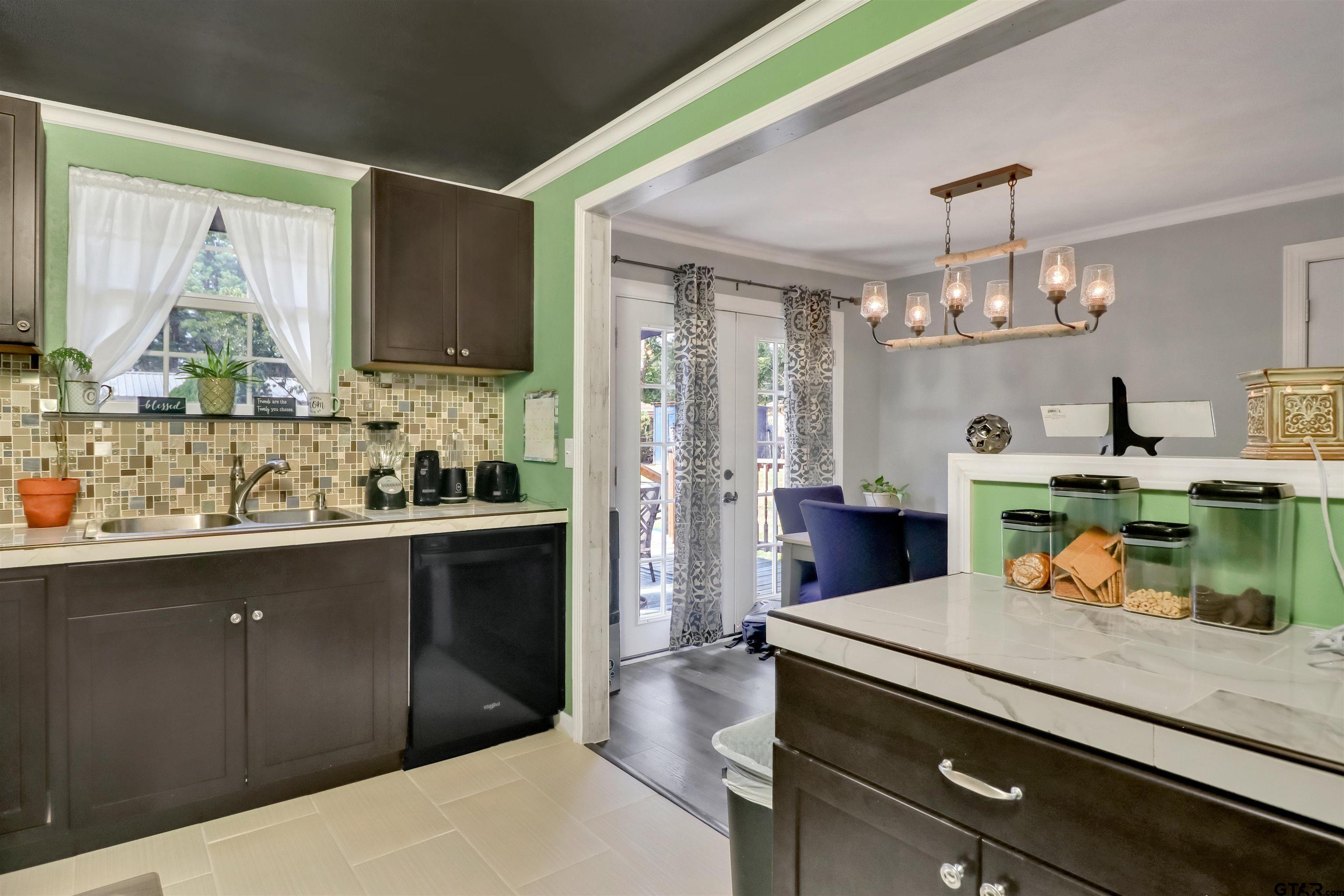 140 County Road 1541 Rusk, TX 75785 - Photo 7 of 21 a kitchen with stove and cabinets