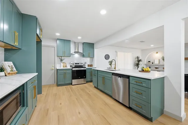 a view of a kitchen and dining room