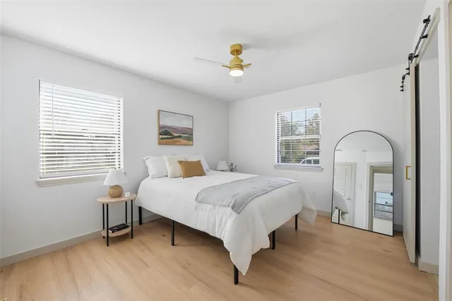 a kitchen with stainless steel appliances kitchen island granite countertop a sink counter space and cabinets