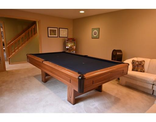 25 Azalea Road Sharon, MA 02067 - Photo 9 of 21 a bed room with a bed and a couch