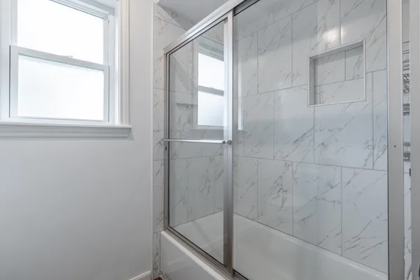 a bathroom with a bathtub