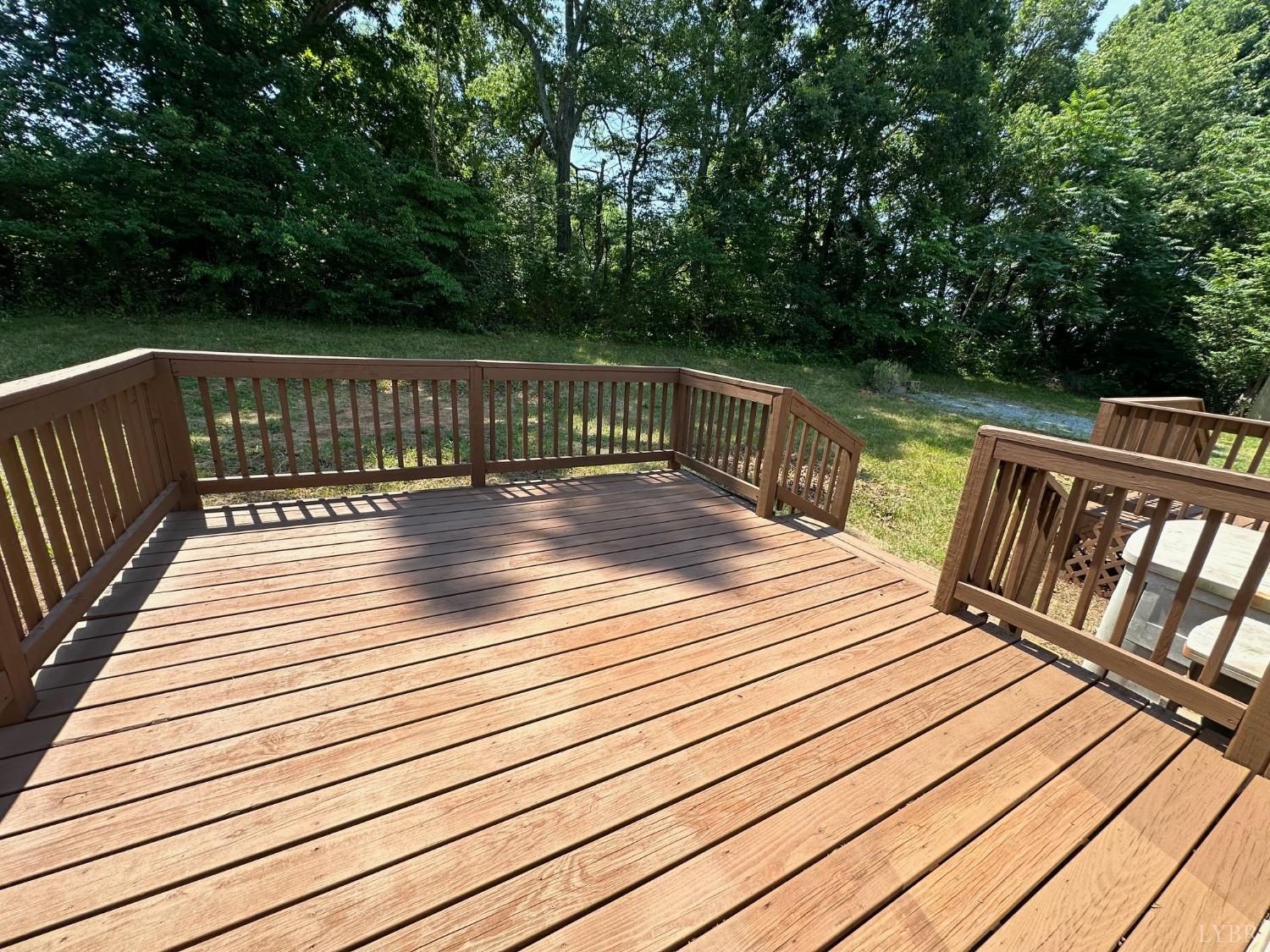6337 Bethany Road Rustburg, VA 24588 - Photo 23 of 24 a view of deck with wooden floor and seating space