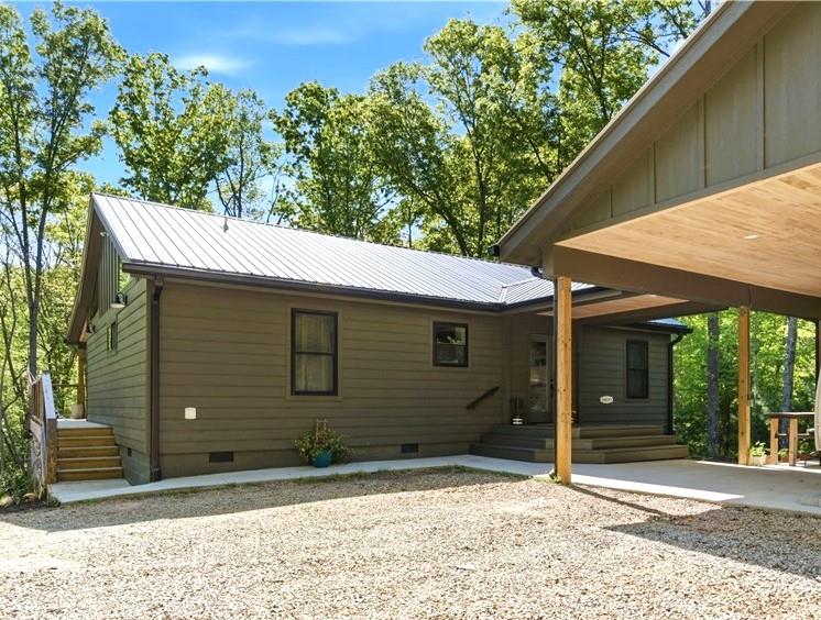 191 Oakwood Road Blairsville, GA 30512 - Photo 11 of 43 a backyard of a house with seating space