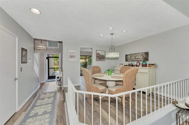 a kitchen with a stove a sink and a microwave