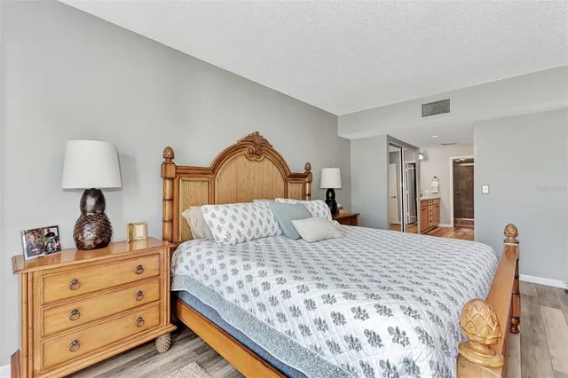 a view of a garden with a building in the background