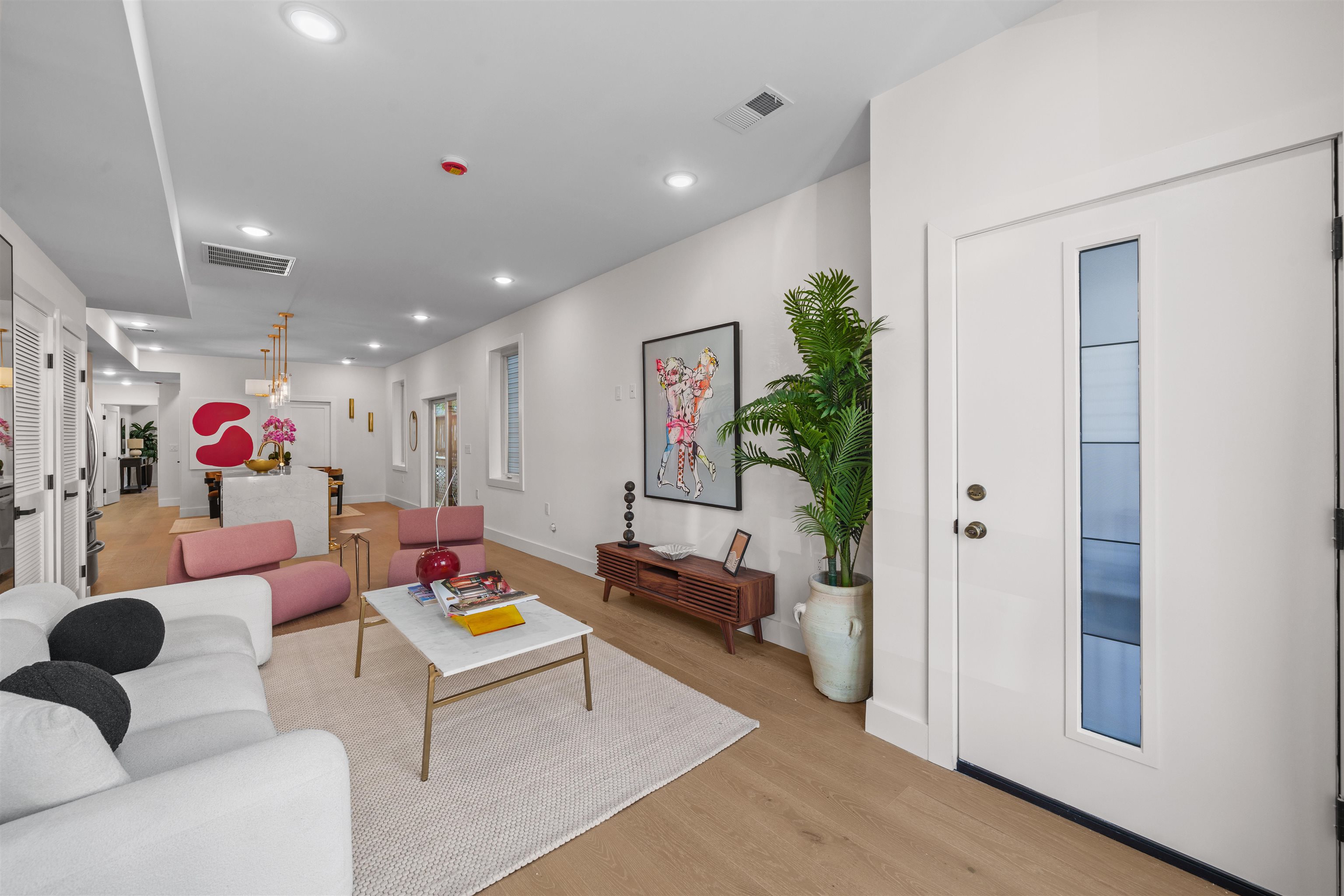 249.5 Halladay Street, Unit 1 Jersey City, NJ 07304 - Photo 9 of 31 a living room with furniture and a potted plant