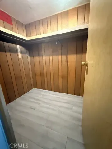 a view of bathroom with tub and window