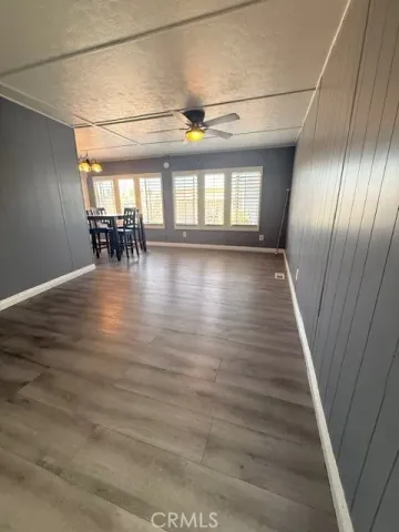 a view of gallery with wooden floor