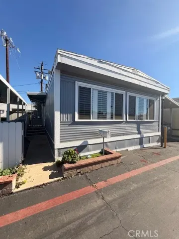 a house view with a backyard space