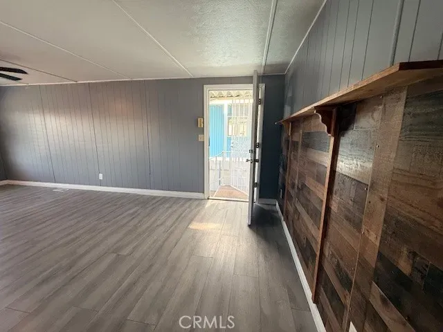 a view of entryway with wooden floor