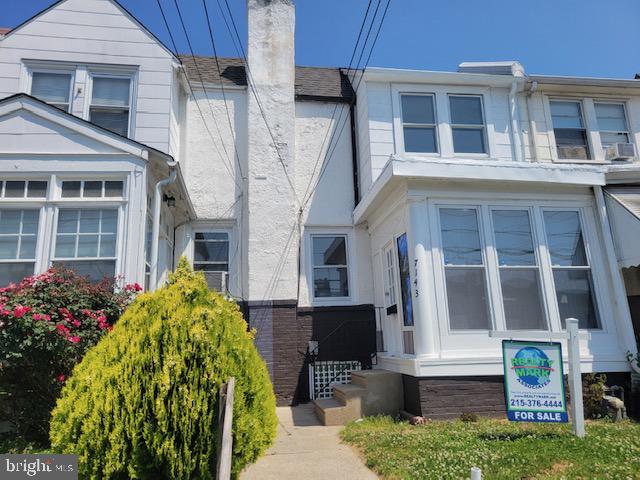 7143 Radbourne Road Upper Darby, PA 19082 - Photo 1 of 19 a front view of a house with garden