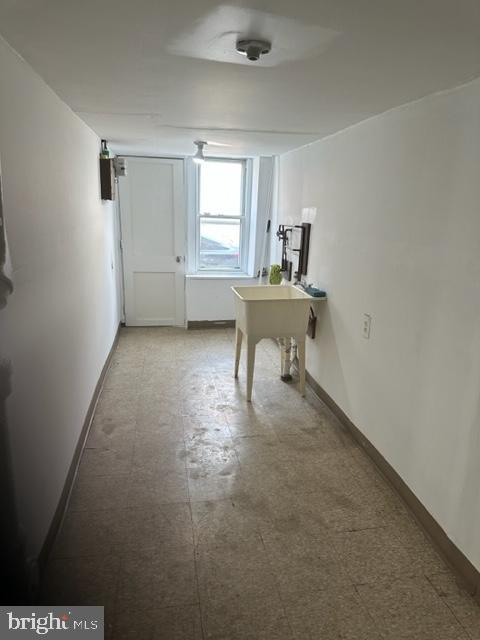 7143 Radbourne Road Upper Darby, PA 19082 - Photo 12 of 19 a view of a livingroom with wooden floor and a window