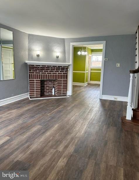 7143 Radbourne Road Upper Darby, PA 19082 - Photo 2 of 19 a view of an empty room with a window and wooden floor