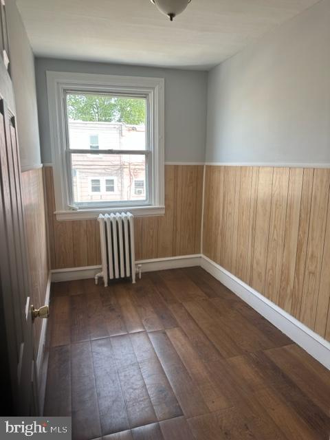 7143 Radbourne Road Upper Darby, PA 19082 - Photo 10 of 19 an empty room with wooden floor and windows