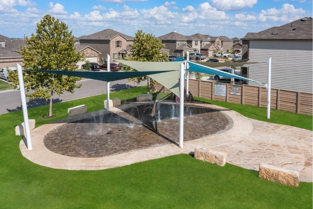 133 Hatari Trail Jarrell, TX 76537 - Photo 32 of 33 a view of a house with a park