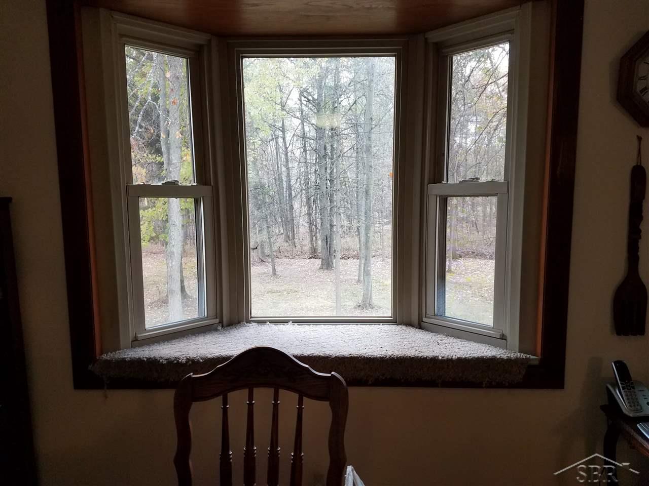 6760 South Steel Road St. Charles, MI 48655 - Photo 21 of 43 Dining Room bay window