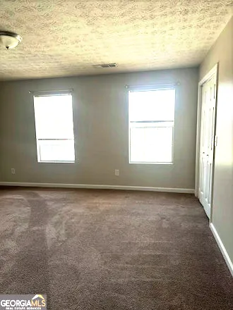 a view of a livingroom with a window