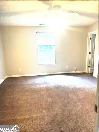 a view of a room with an empty space