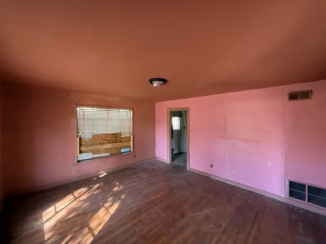 a view of a livingroom with a staircase