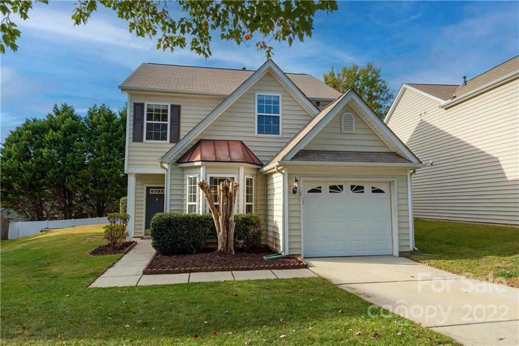3106 Tanzanite Circle Fort Mill, SC 29708 - Photo 1 of 36 a front view of a house with a yard