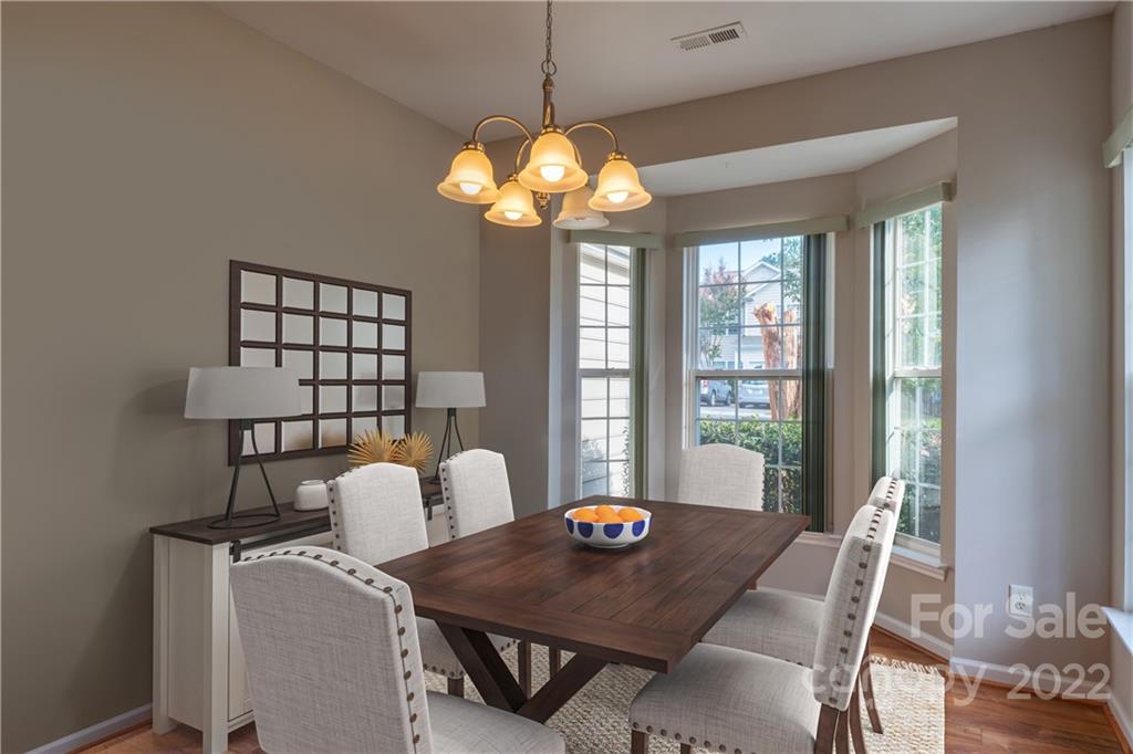 3106 Tanzanite Circle Fort Mill, SC 29708 - Photo 12 of 36 a view of a dining room with furniture window and outside view