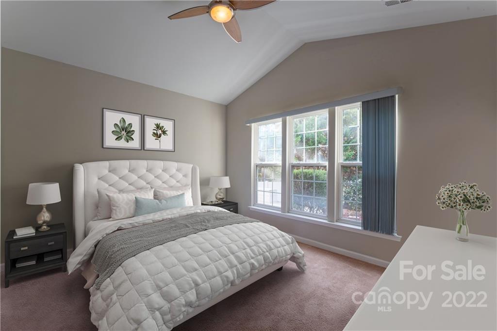 3106 Tanzanite Circle Fort Mill, SC 29708 - Photo 15 of 36 a bedroom with a large bed and a window
