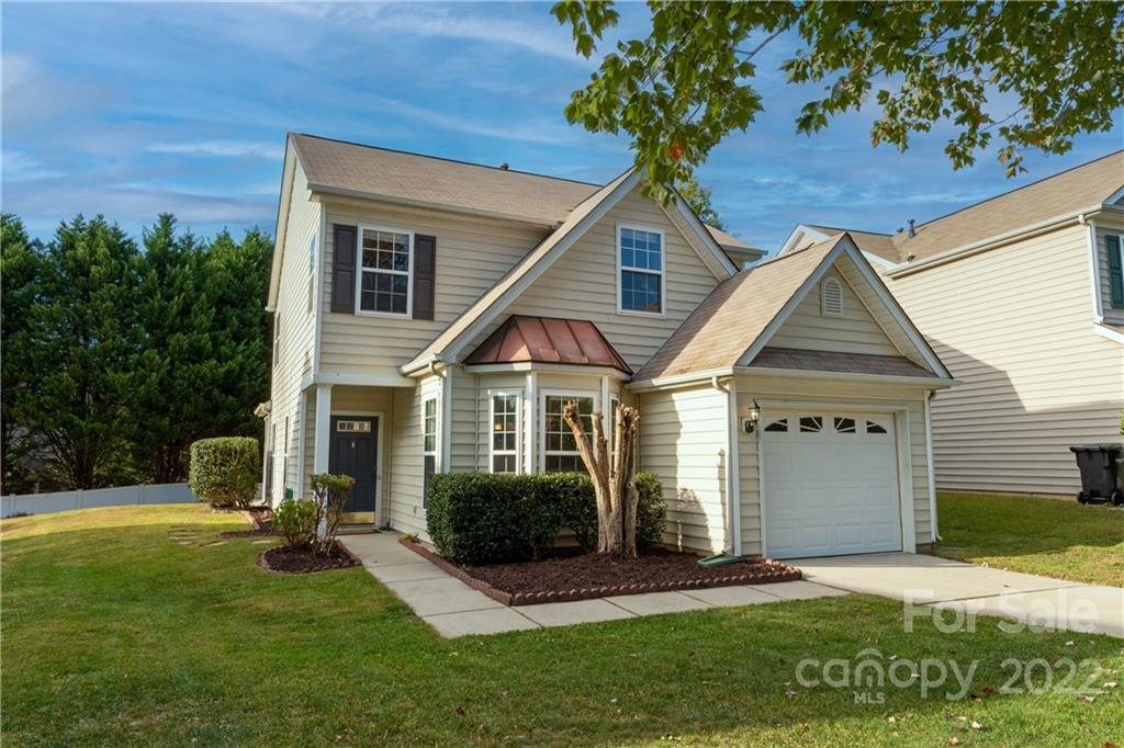 3106 Tanzanite Circle Fort Mill, SC 29708 - Photo 2 of 36 a front view of a house with a yard
