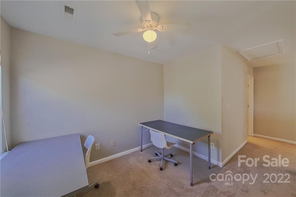 3106 Tanzanite Circle Fort Mill, SC 29708 - Photo 25 of 36 an empty room with a fan and a window