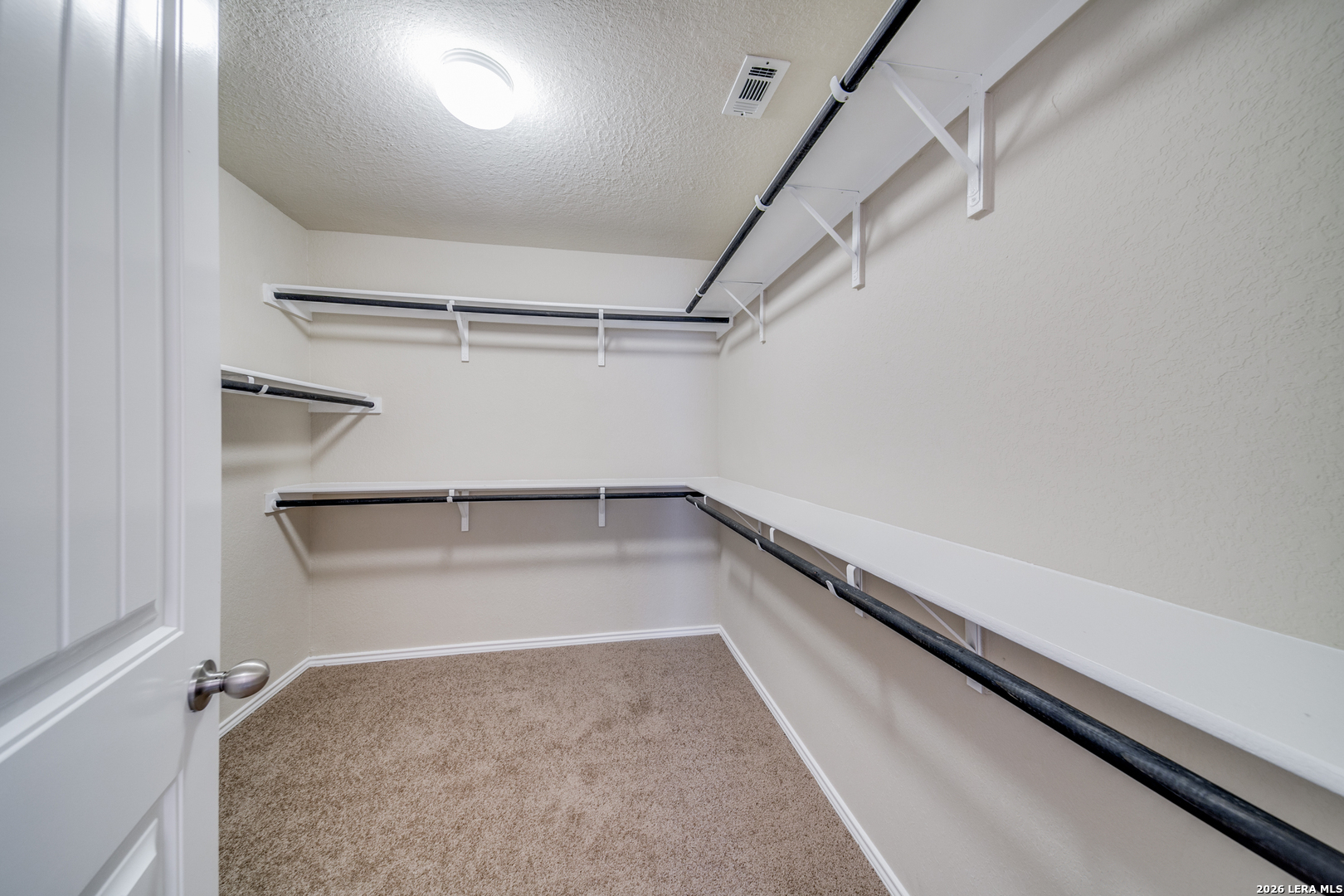 12358 Erstein Schertz, TX 78154 - Photo 15 of 21 a view of a room with racks on the wall