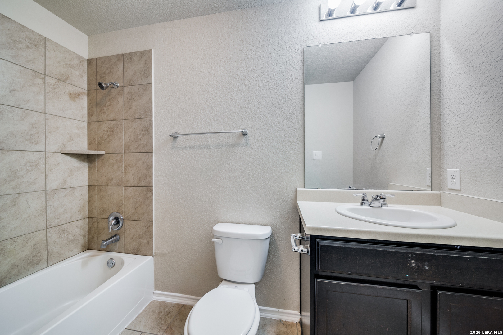 12358 Erstein Schertz, TX 78154 - Photo 19 of 21 a bathroom with a sink toilet and shower