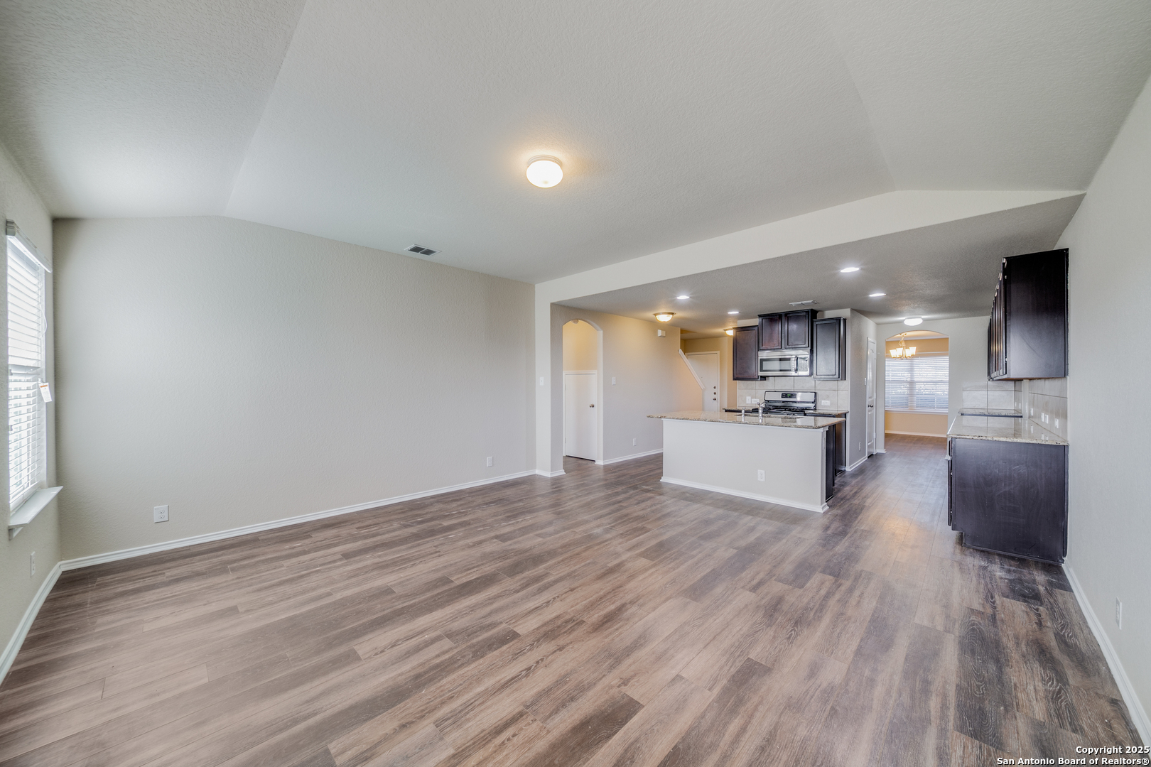 12358 Erstein Schertz, TX 78154 - Photo 3 of 8 a view of kitchen and hall with wooden floor