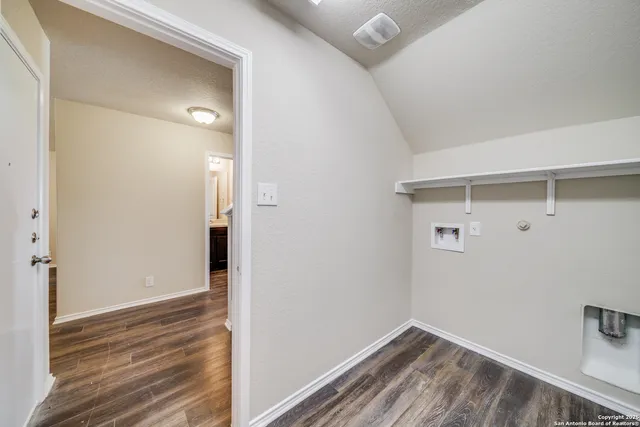 a view of small space with racks on the wall