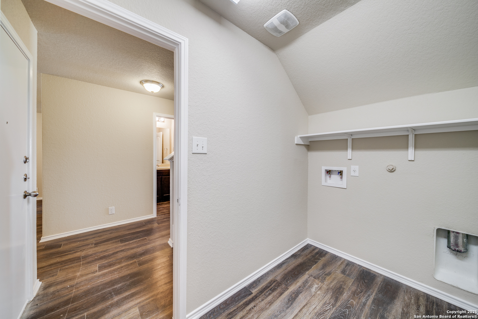 12358 Erstein Schertz, TX 78154 - Photo 6 of 8 a view of small space with racks on the wall