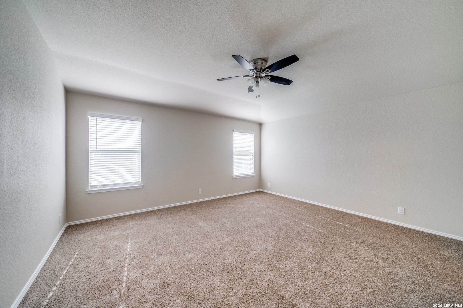 12358 Erstein Schertz, TX 78154 - Photo 7 of 21 a view of empty room with windows