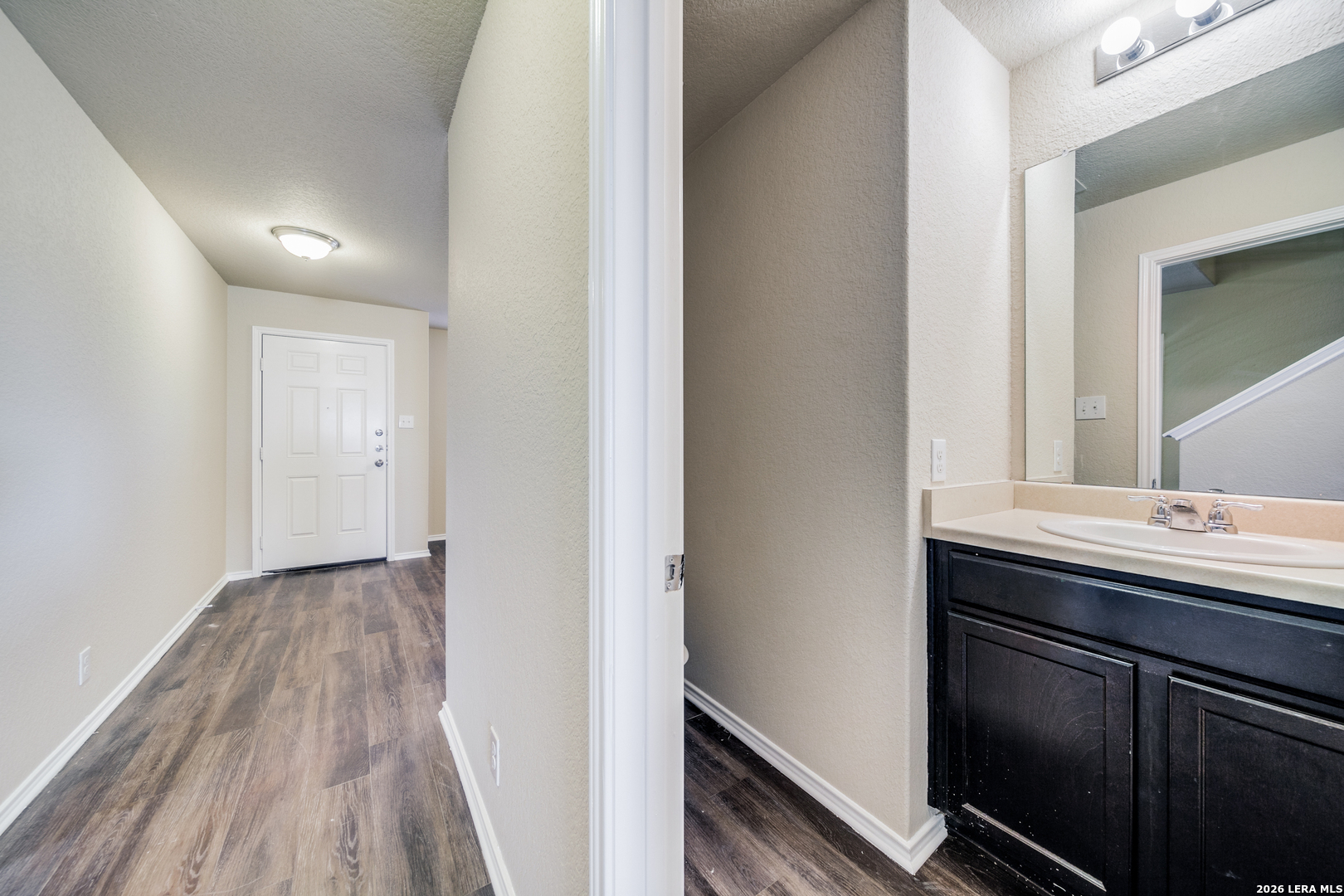 12358 Erstein Schertz, TX 78154 - Photo 9 of 21 a view of a sink from a hallway