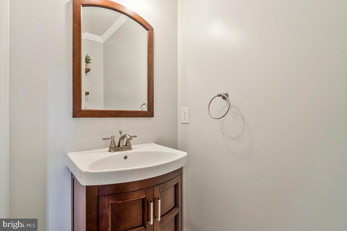 12630 Grosstown Road Hughesville, MD 20637 - Photo 9 of 44 a bathroom with a sink and a mirror