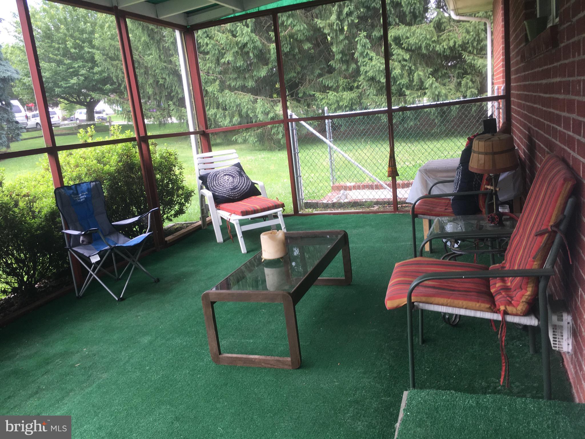 2407 Larkin Road Boothwyn, PA 19061 - Photo 32 of 33 Screened in porch