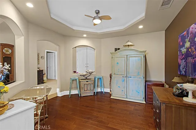 a view of a livingroom with furniture and a window