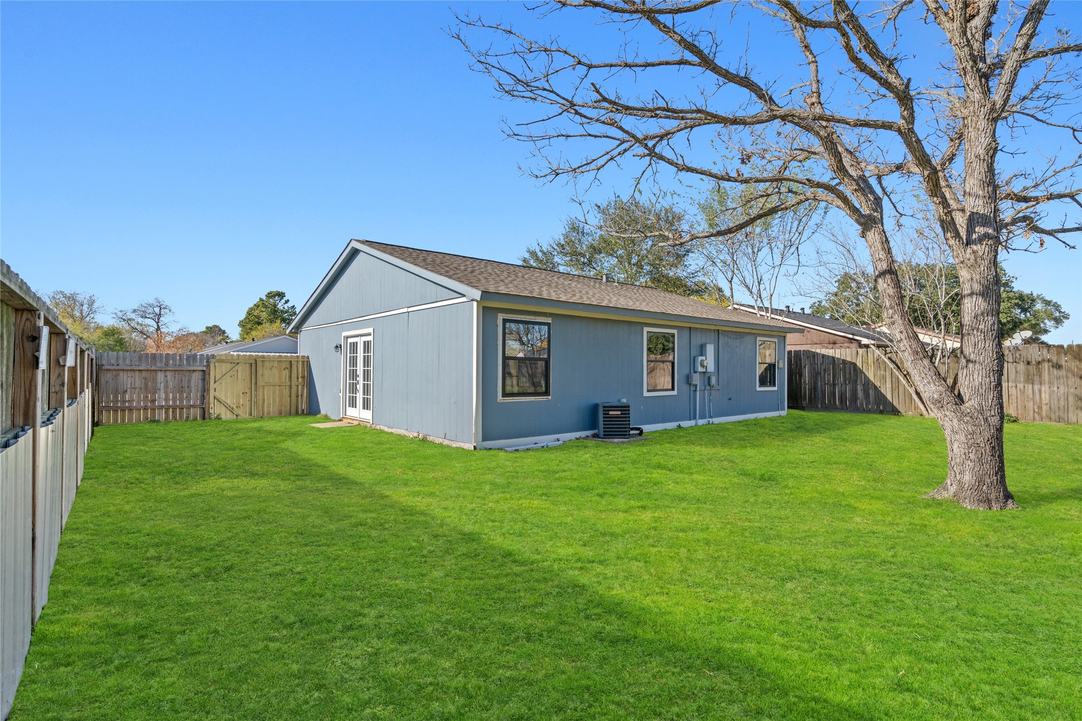 17510 Bullis Gap Drive Hockley, TX 77447 - Photo 18 of 21 a view of a yard in front of a house with large trees