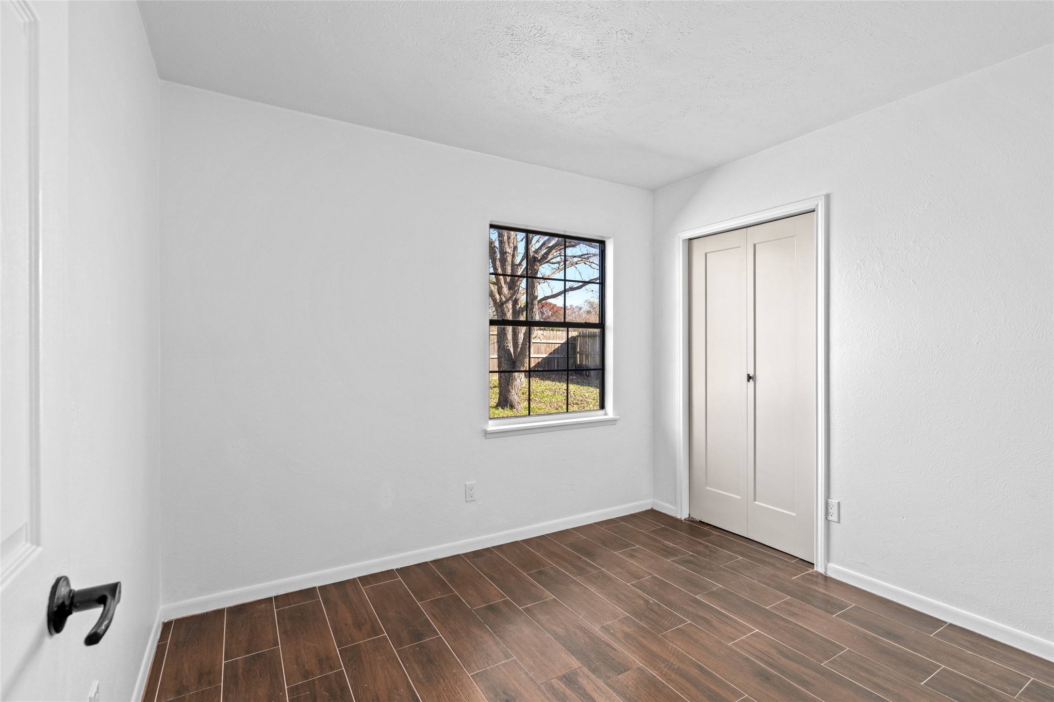 17510 Bullis Gap Drive Hockley, TX 77447 - Photo 10 of 21 an empty room with windows and closet