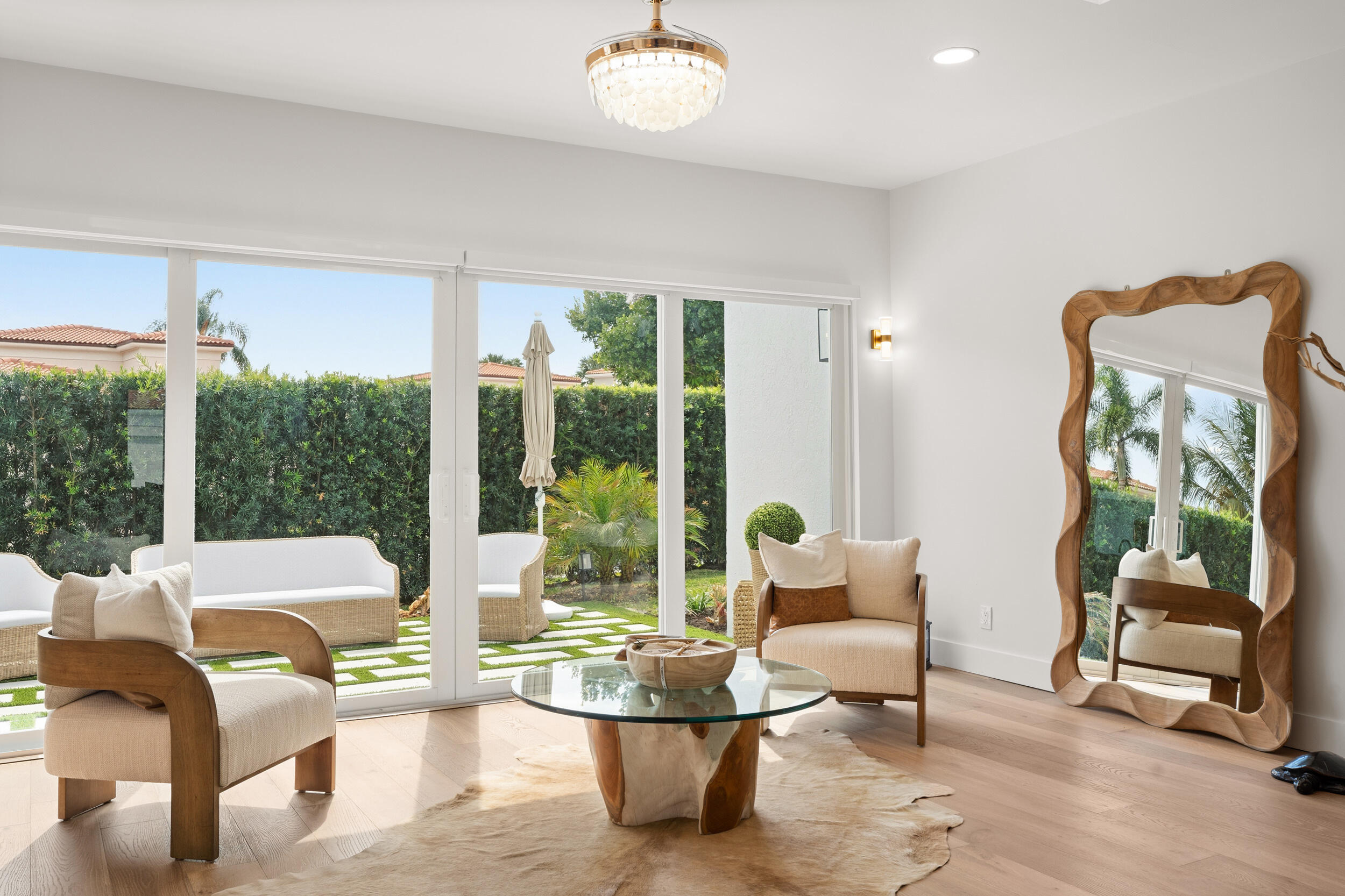 3660 Northwind Court Jupiter, FL 33477 - Photo 11 of 69 a living room with furniture and a large window